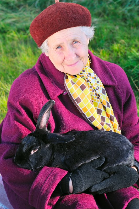 A woman holding her bunny 